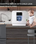 Portable Countertop Dishwasher With Built In Water Tank And Pull Rack Features 360 Dual Spray Arms and child lock, shown on kitchen countertop with child.