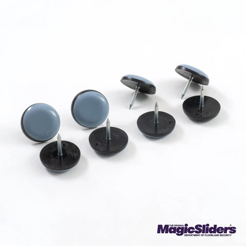 Heavy Duty Reusable Furniture Sliders With Tough Self Adhesive Grip For Effortless Couches And Tables Across Carpet Or Hardwood Floors Skip The Dragging Just Smooth Glides Non Skid Pads Grey Set Of Eight in a close-up view, showcasing grey disc pads with black bases.