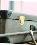 Retro Toggle Lock Latch Hardware 5pc Set on suitcase showing zinc alloy golden clasp for secure closure kit.