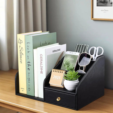 Premium PU Leather Desk Organizer With Drawer And Four Compartments Vertical File Holder And Magazine File Holder Desktop Office Storage In Sleek Black A Dope Gift For Men Who Have Everything holding books, phone, glasses, and pens on a desk.