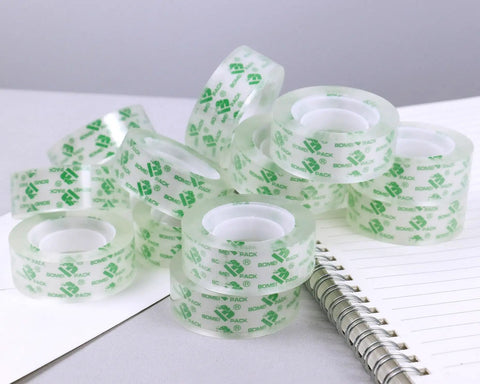 Value Pack 48 Clear Tape Rolls for Dispenser 3/4 x 1000 Inches Each 1 Inch Core on desk with notebook