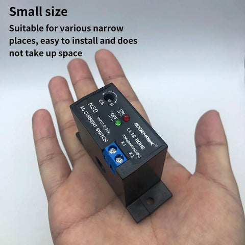 No Fuss AC Current Sensing Relay With 0 To 30 Amp Range featuring Normally Closed Contacts in a technician's hand.