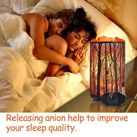 Himalayan Salt Lamp With Forest Design Metal Basket Natural Night Light With Dimmer Switch 25W Bulb Included ETL Cord Cozy Amber Glow To Boost Mood And Create A Chill Romantic Vibe. Couples sleeping next to glowing lamp on nightstand.