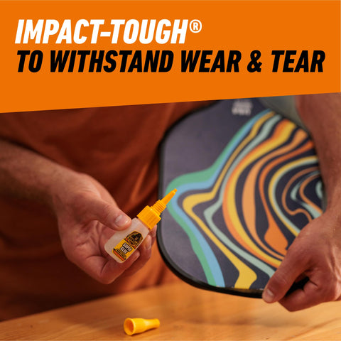 Person applying All Purpose Clear Super Glue With Brush And Precision Nozzle Fast Acting Bond For Glass Plastic Wood Metal Ceramic Rubber And Leather 12 Gram Pack For Quick Fixes to paddle