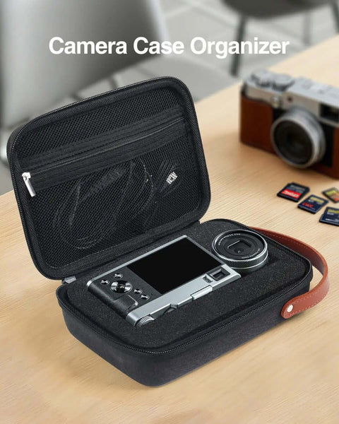 Heavy Duty Hard Eva Case With Removable Soft Foam For Kickass Shockproof Camera And Drone Storage Featuring Crush Resistant Oxford Exterior And Road Ready Travel Shield with a camera inside, on a wooden surface.