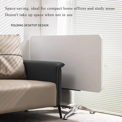 No Sweat Adjustable Height Rolling Drafting Desk With Flip Top And Book Stop Lightweight White Mobile Workstation Craft Table For Home Office Easy Roll Setup Stepless Tilt Surface Built Solid, showing folding design next to a sofa.