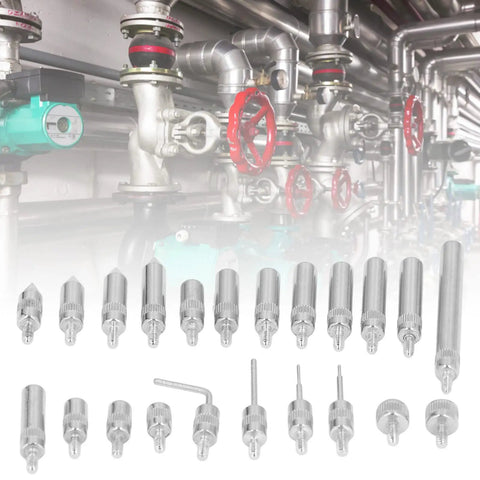 Threaded Point Tip Set For Dial Indicators, 22Pcs Carbide Probe End Tips With Storage Case, laid out in front of industrial pipes