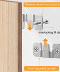 Massive 200-Piece Flush Mount Bracket Set With Stainless Steel Hanging Buckles showing interlocking M clips on wall and frame