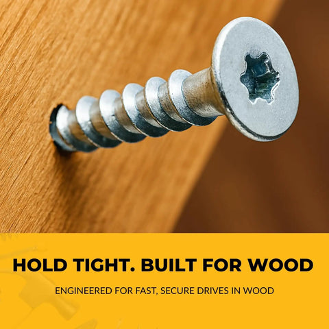 Close-up of PowerHead Flat Head Wood Screw partially drilled, showing Torx T20 drive and zinc finish for wood fastening.