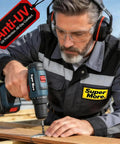 Man using Shop Ready 12 Pack Safety Glasses For The Daily Hustle And Sports, Ansi Z87.1 Rated while drilling wood.