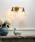 Industrial Dope Double Sconce Wall Light With Dual Seven Point Three Inch Cone Clear Glass Shades Brushed Metal Finish E26