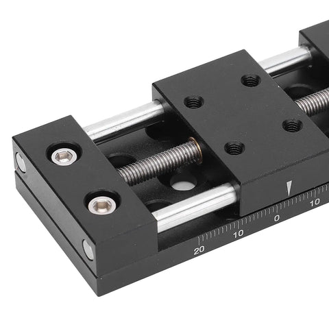 Built Tough Aluminum X Axis Sliding Table With Precision Manual Knobs For Micro Adjustments And Smooth As Silk Fine Tuning On Optical Gear And Measurement Stages close-up view of aluminum sliding table with precision knobs.