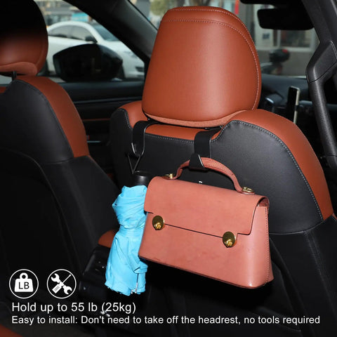 Mazda CX50 Interior Upgrade Kit headrest hook holding a pink handbag and umbrella inside a 2023-2025 CX50 Hybrid.