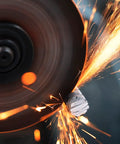 EZARC cutoff wheel in action cutting metal; 3-inch, 1/16-inch thick, 3/8-inch arbor for die grinder; sparks fly