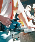 Game Changing 18V LXT Cordless Metal Cutter Shreds Steel Sheets Pipes Square Tubing And Unistrut 3600 RPM in use at construction site.