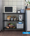 Adjustable Three Tier Metal Wire Shelving Unit In Sleek Black With Flexible Height Configuration Easy Peasy Assembly Perfect For Garage Pantry Or Closet Nifty Space Saver built with bowls, food supplies, and a microwave in kitchen.