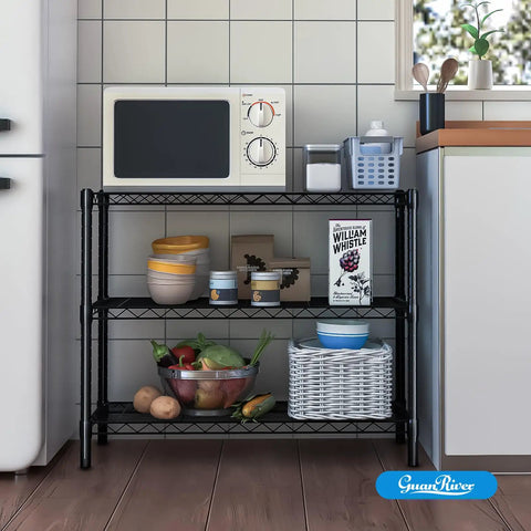 Adjustable Three Tier Metal Wire Shelving Unit In Sleek Black With Flexible Height Configuration Easy Peasy Assembly Perfect For Garage Pantry Or Closet Nifty Space Saver built with bowls, food supplies, and a microwave in kitchen.