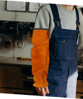 Heavy Duty Cowhide Welding Arm Sleeves Heat Resistant Flame Retardant full coverage orange arm protector worn by a mechanic