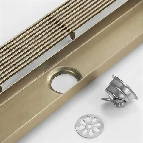 Top Shelf Game Changer Stainless Steel Rectangle Floor Drain Cover With Removable Grate Hair Catcher Filter For Bathroom Shower, showing drain cover, grate and hair filter.