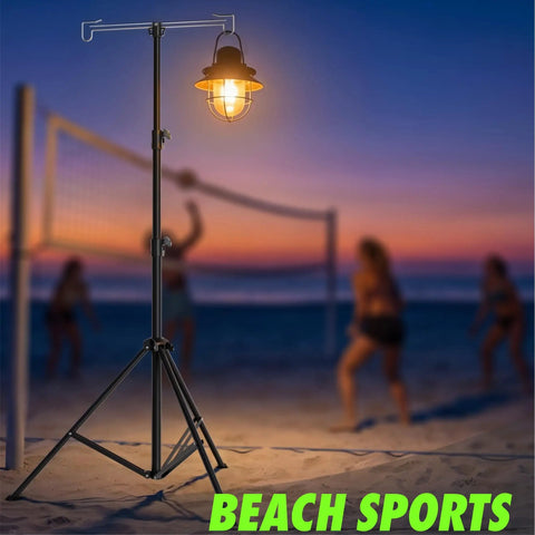 Adjustable Telescopic Lantern Tripod Stand For Camping And Outdoors, Height Range 28.5 Inches To 82.7 Inches on beach at sunset
