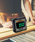 Tough As Nails Digital Angle Finder Crisp Readings Electronic Protractor on a workbench showing 0.50° for precise measurements.