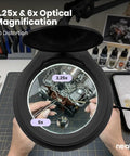 LED Magnifying Floor Lamp With Dual Bifocal Lenses 2.25x And 6x, 1200 Lumens, showing lens magnification on hobby model.
