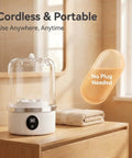 Pocket Sized Rechargeable Mini Washing Machine Wash Your Damp Threads With Ease For Gym Kits Socks Undies And Baby Rags Quick Travel Laundry Hack Compact Backpack Friendly Spin Cycle Fast Rinse Mode on a wooden counter.