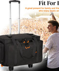 Rolling DJ Cable Bag With Laptop Pocket And Microphone Pocket Gear Case with wheels and retractable handle at a DJ event.