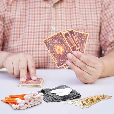 Person holding cards with Top Shelf Lint Free Foam Swabs For Nitty Gritty Electronics Camera Lenses Vents And Printer Heads 200 Piece Orange Pack.