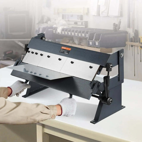 Box And Pan Brake 24 Inch Portable Metal Bender with 0 to 135 Degree Bending Handles, shown in a workshop setting.