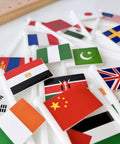 Close-up of 36 country flags from Montessori World Flags Set With 22 Inch Wooden Map And 36 Country Flags On Solid Beechwood For Kids