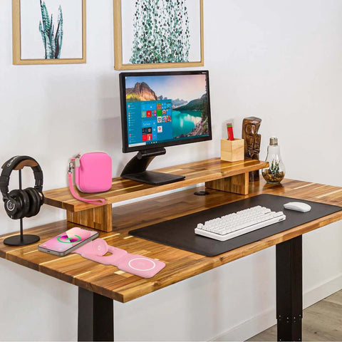 Tough Love Hardshell Travel Case For Magnetic Foldable 3 In 1 Chargers on a wooden desk with computer and accessories.