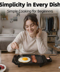 Person cooking egg and bacon on Tiny But Mighty 10 Inch Mini Ceramic Electric Griddle With Adjustable Thermostat 1200W Nonstick Skillet.
