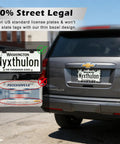 Glitzy License Plate Frame Set For Women with stainless steel rhinestone frame, shown on a car, showcasing its legal compliance.
