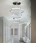 LED Crystal Chandelier With 4 Ring Design, Modern Stainless Steel Pendant Light, Adjustable Length Up To 47 Inches in hallway