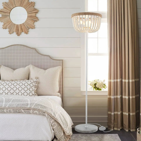 Boho Floor Lamp With White Wood Beaded Shade For Bedroom Living Room And Girl Room Three Light Bulb Fixture Cozy Warm Glow Durable Rustic Modern Decor next to bed in cozy room.