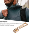 Man adjusting jacket zipper with 5 Piece Zipper Sliders Set For Quick On The Go Fixes Detachable Reusable Zipper Pulls Replacement Kit For Coats Jackets Bags And Nylon Coil Zippers Works With Metal And Plastic Zippers In Light Gold.