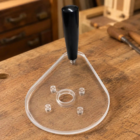 Score Your Shop Upgrade With This Six By Nine Inch Clear Acrylic Router Base Plate Built Straight For Makita Compact Models Featuring Pre Drilled Mounting Holes And Three Eighth Inch Thickness For Rock Solid Precision Woodworking, showing clear acrylic design with grip handle.