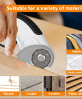 Heavy Duty Cordless Electric Scissors With Rechargeable Battery cutting cardboard with variety of materials visible.