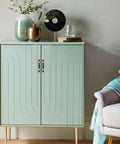 Modern cabinet with geometric design, decorated with vases and books, in a living room setting