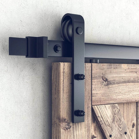 Close-up of 6.8 Foot Sliding Barn Door Hardware Kit With 6.8 Foot Track Kit, Pull Handle Set And Floor Guide For 36 To 40 Inch Doors J Shape Smooth Quiet Operation Easy To Install Black Powder Coated Durable Alloy