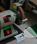 Heavy Duty Clear Plastic Shield For Bench And Angle Grinder Featuring Dust Blocking Guard and Wear Resistant Material on workbench.