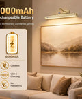 Premium Rechargeable Motion Sensor Picture Light Gold Wall Mounted Frame Illuminator with 6000mAh battery above artwork.