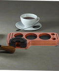 Sturdy Wooden Espresso Tamper Station Featuring Slick Portafilter Holder And Compact Coffee Organizer To Keep Your Kitchen Counter Looking Fresh And Totally Built For The Morning Rush with coffee cup