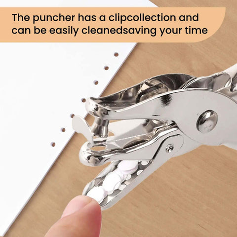 Close-up of Seventeen Piece One Eighth Inch Circle Hole Punch Set showing metal construction with sheet in use for crafts
