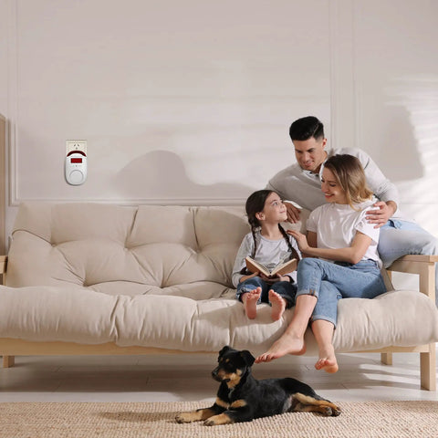 Family on a couch with Three Pack Carbon Monoxide Detectors Plug In CO Alarm With Digital Display For Home Kitchen Hotel Bedroom White Accurate Readout Easy To Use Quick Plug In Safety Monitors on the wall