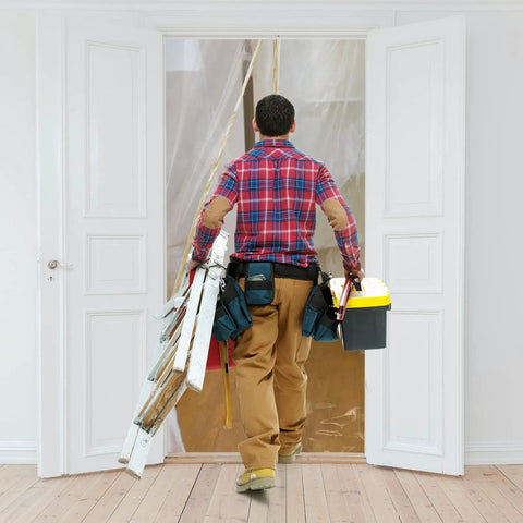 Worker installing Dust Barrier Zip Door For Renovations, Heavy Duty Plastic Door Cover With Zipper To Contain Dust In Kitchen