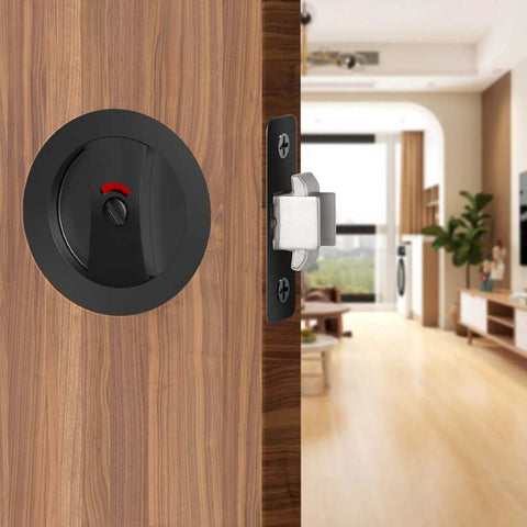 Matte Black Pocket Door Lock Set With Privacy Indicator for Sliding and Pocket Doors installed on wooden interior door
