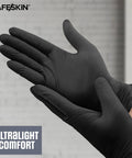 Safeskin ultralight black nitrile disposable gloves, X-Large, 2.0 mil, powder-free, worn on hands (front view)