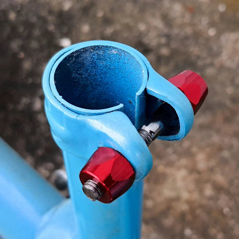 Red Aluminum Alloy Seatpost Binder Bolt on blue frame, 45mm easy install seat clamp screw for Road MTB, Vintage Steel Frames.